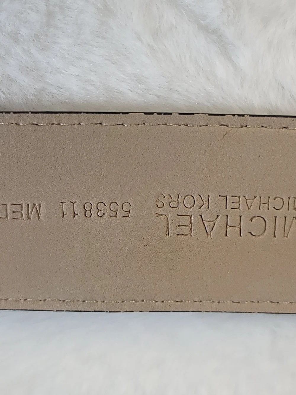 Michael Kors noticeable strap